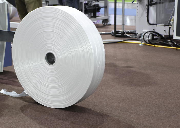 roll of industrial plastic as material lay flat tubing