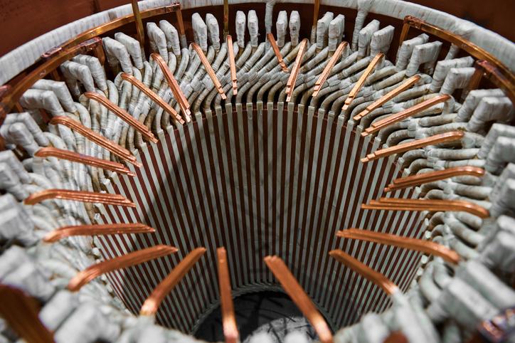 motor winding insulation seen as part of a contemporary electric motor with brass details